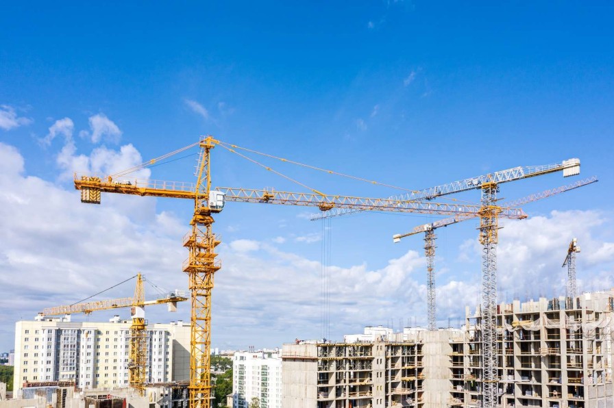 Architectuur Wallgroup | Hijskranen Aan Het Werk Fotobehang