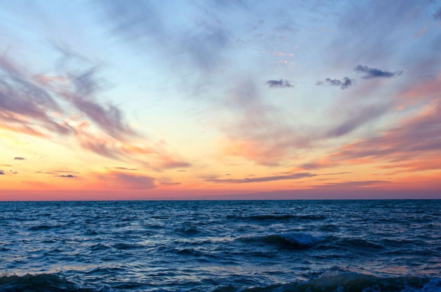 Landschap Wallgroup | Zonsondergang Op Open Zee Fotobehang