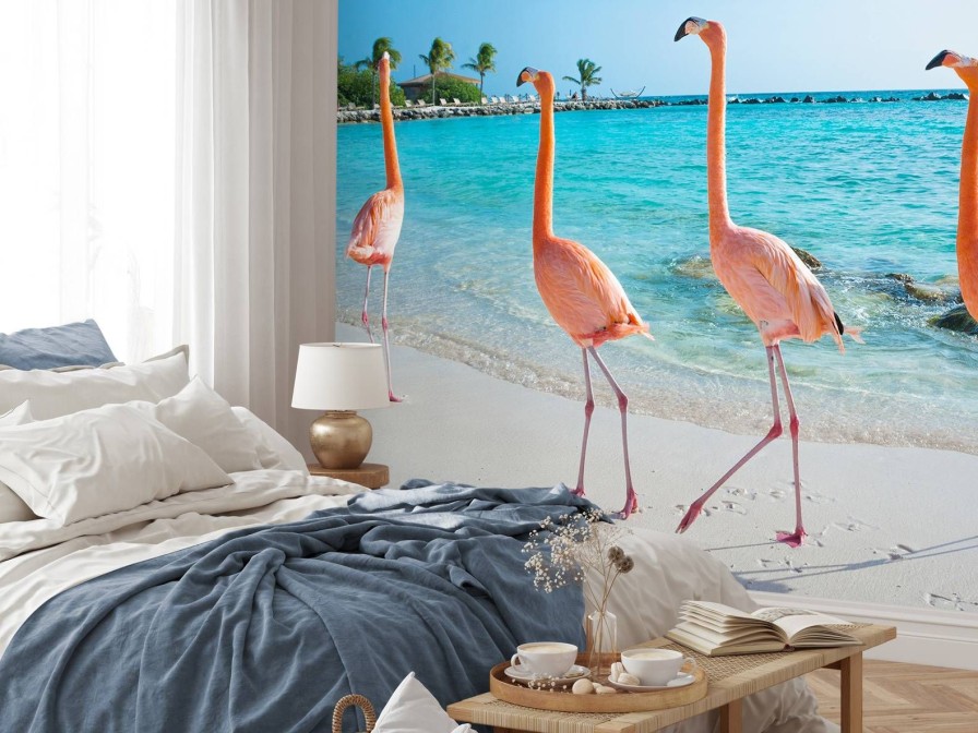 Dieren Wallgroup | Rij Van Flamingo'S Op Het Strand Fotobehang