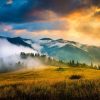 Landschap Wallgroup | Berglandschap Met Mist Bij Zonsondergang Fotobehang