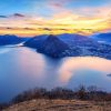 Landschap Wallgroup | Bovenaanzicht Op Een Stad Met Bergen Fotobehang