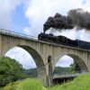 Architectuur Wallgroup | Stoomtrein Op Een Viaduct Fotobehang