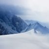 Landschap Wallgroup | Landschap Op Een Hoge Ingesneeuwde Berg Fotobehang