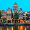 Architectuur Wallgroup | Amsterdamse Grachtenpanden In De Avond Fotobehang