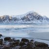 Landschap Wallgroup | Grote Ingesneeuwde Rots In Noorwegen Fotobehang