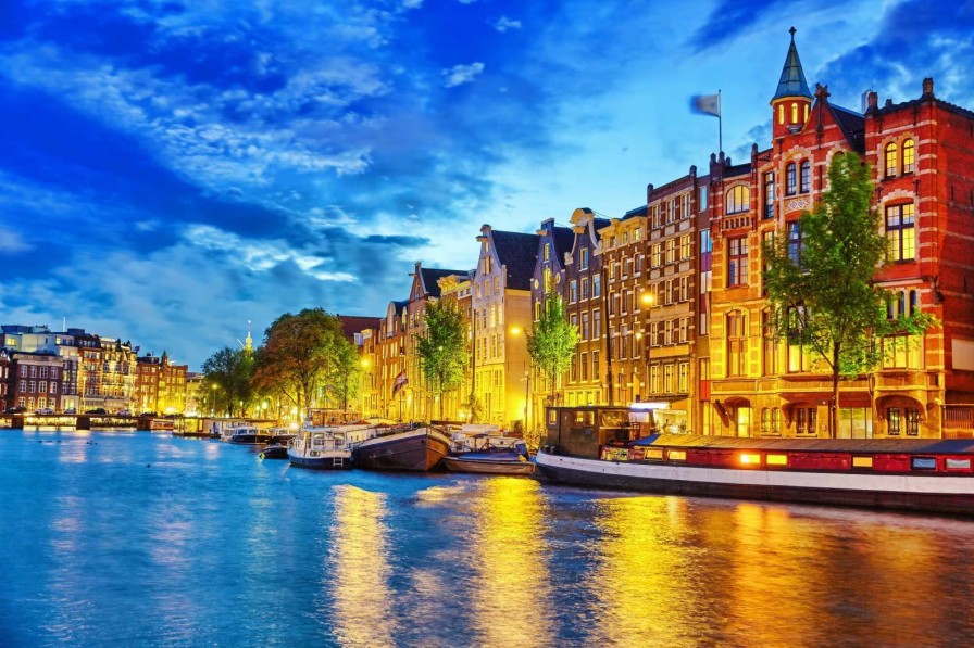 Architectuur Wallgroup | Rivier De Amstel In De Avond Fotobehang